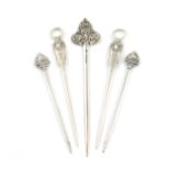 A small collection of five Victorian silver poultry skewers, by George Adams, London, comprising: