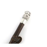 A Victorian silver handled umbrella, by F B Thomas & Co, London 1896, the handles modelled as