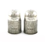 By Gerald Benney, a pair of modern silver commemorative salt and pepper pots, London 1980, no. 79 of