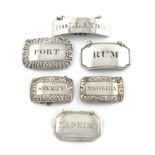 A collection of six antique Scottish silver wine labels, Glasgow, various makers, incised '