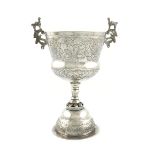 A 19th century South American silver two-handled cup, unmarked, probably Peruvian, tapering circular