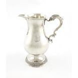 A George III silver beer jug, the maker is probably Ambrose Boxwell, Dublin 1774,