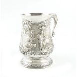 A George III silver mug, over-stamped with maker's mark of T.L, London 1785, baluster form, leaf