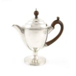 A George III silver argyle, by Peter and William Bateman, London 1810, vase form, scroll handle, the
