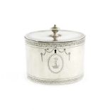 A George III silver tea caddy, by John Denziloe, London 1781, oval form, flush-hinged cover with a