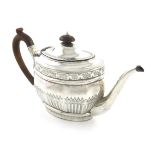 A George III silver teapot, by Charles Chesterman, London 1801, oval form, bright-cut decoration
