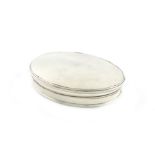 A George II silver snuff box, unmarked, circa 1740, oval form, the plain hinged covers to reveal a