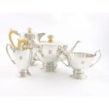 λA four-piece silver Art Deco tea set, by Edward and Sons, of Glasgow, Sheffield 1937, circular