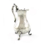 An 18th century Dutch silver cream jug, by Harmanus Nieuwenhuys, Amsterdam 1758, baluster form,