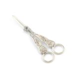 A pair of Victorian silver Stag Hunt pattern grape scissors, by George Adams, London 1879, ring