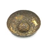 An Ottoman provincial parcel-gilt silver dish, unmarked, probably 18th century, circular form,