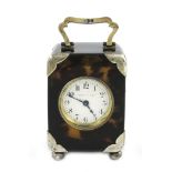 λA silver-gilt mounted tortoiseshell clock, by Charles and Richard Comyns, London 1919, retailed