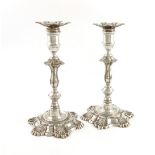 A pair of modern silver candlesticks, by J B Chatterley & Sons Ltd, Birmingham 1968, in the mid-18th