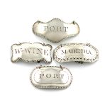 A small collection of four George III Irish silver wine labels, comprising: one by John Teare,