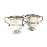 A pair of mid-18th century Irish silver cups, by George Cartwright, Dublin circa 1750, circular