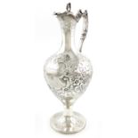 A Victorian silver ewer, by Elkington and Co, Birmingham 1854, baluster form, embossed foliate