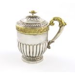 A 19th century Russian parcel-gilt silver cup and cover, Assay master Nikolay Dubrovin, Moscow 1829,