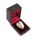 A late 19th century French silver vinaigrette, retailed by Odiot, Paris, egg form, engine-turned