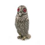 A late-Victorian novelty silver owl pepper pot, by George Unite, Birmingham 1897, modelled in a