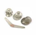 A small collection of three silver jockey cap caddy spoons, comprising: an Australian one by Davis