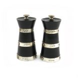 A pair of silver-mounted wooden pepper mills, by Hukin and Heath, Birmingham 1927, churn form, the