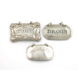 A small collection of three antique York silver wine labels, comprising: one by Barber and Whitwell,