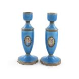 A pair of Austrian silver and enamel candlesticks, by R.S, tapering circular form, plain urn