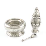 By Georg Jensen, a Danish silver pepper pot and salt cellar, the salt with import marks for London