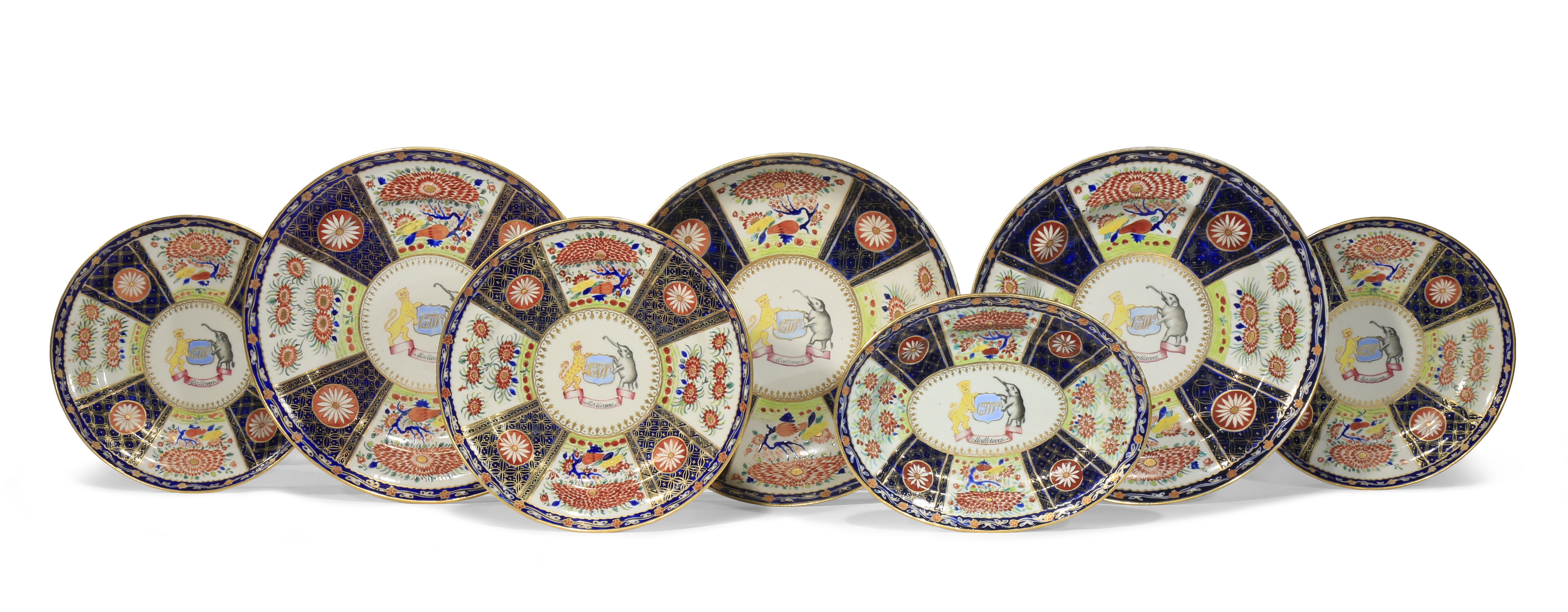 SEVEN CHINESE ARMORIAL DISHES FROM THE WOLTERBEEK SERVICE C.1818 Comprising: six circular dishes and