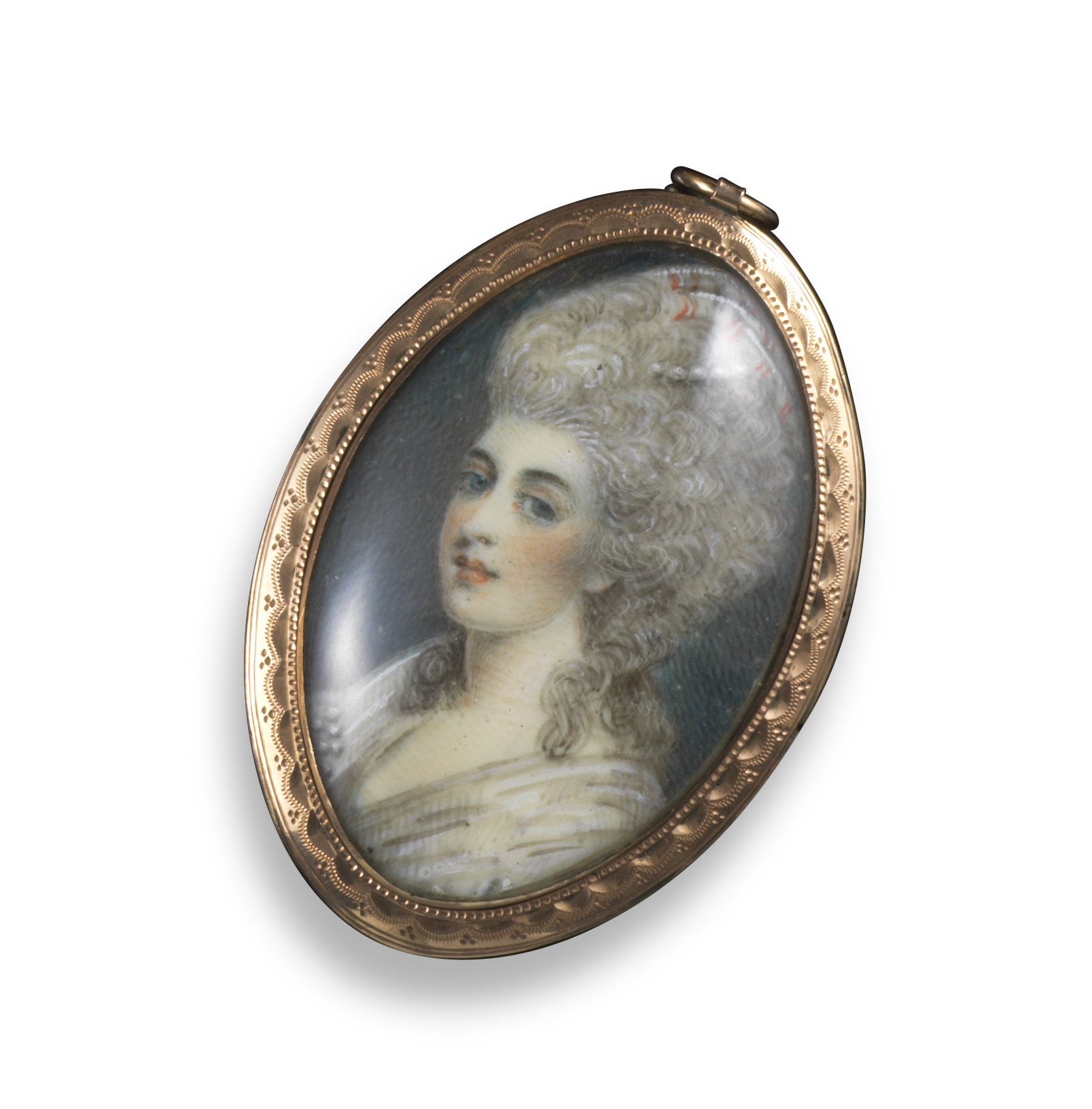 A George III portrait miniature pendant, depicting a woman in profile, within engine-turned gold