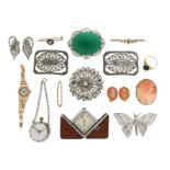 A gold ring set with a moss agate cabochon, three gold bar brooches, a lady's gold wristwatch, a