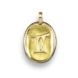 A gold zodiac pendant by Cartier, depicting Gemini, signed and numbered 108432, 2.5cm high