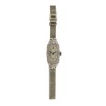 A lady's diamond-set Art Deco wristwatch, the plain white dial with Roman numerals with diamond-