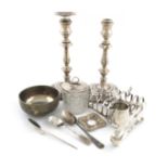 A mixed lot of silver items, comprising a pair of candlesticks, Sheffield 1907, knopped baluster
