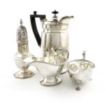 A mixed lot of silver items, comprising: an Edwardian hot water pot, by James Parkes, London 1903,