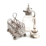 A small mixed lot of electroplated items, comprising: a concertina toast rack, central ring