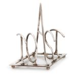 A modern novelty silver toast rack, maker's mark CA or AC, London 2000, the bars modelled as the