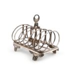 A William IV silver seven-bar toast rack, possibly by Charles Fox, London 1831, wire-work bars,