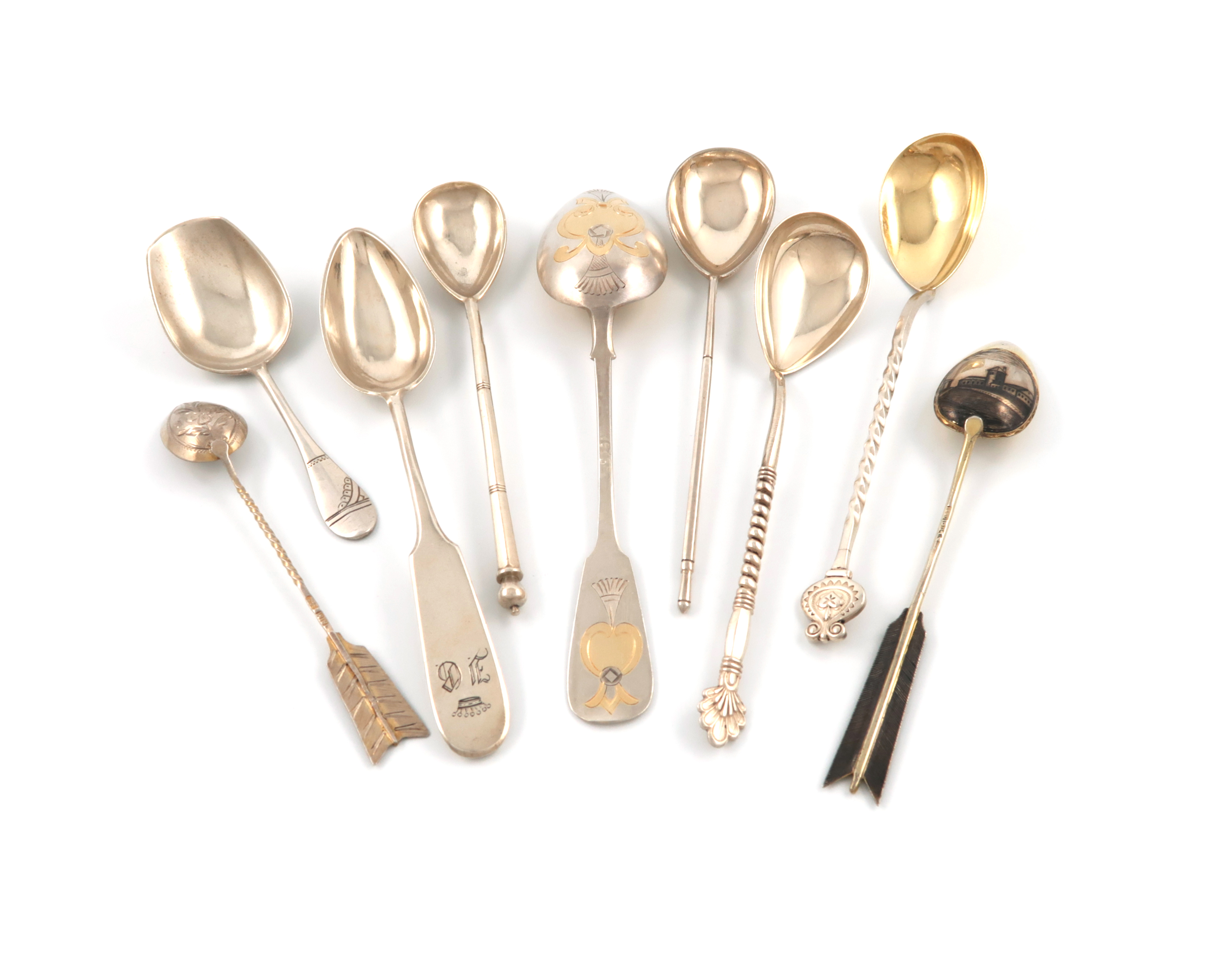 A collection of nine Russian silver spoons, comprising: one modelled as an arrow, 1840, the