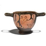 A Greek red-figure owl skyphos South Italian, circa 4th century BC decorated with an owl and