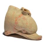 A Hellenistic dolphin head vessel circa 3rd century BC terracotta, naturalistically modelled with
