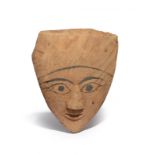 An Egyptian sarcophagus mask Late Period, circa 664 - 332 BC with painted eyes, brows and forehead