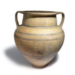 A Cypriot amphora circa 1st millennium BC clay, slip decorated with six lozenge and linear panels to
