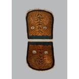 A Tibetan 'tiger' saddle cover in two parts with naturalistic stripes and leather eyelets, the