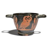 A Greek red-figure owl skyphos South Italian, circa 4th century BC decorated with an owl and