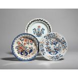 Three delftware plates c.1730-50, one probably Bristol and painted in blue, red and green with a