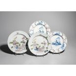 Two pairs of delftware plates c.1740-50, one pair Bristol and painted in blue with a hut beneath a