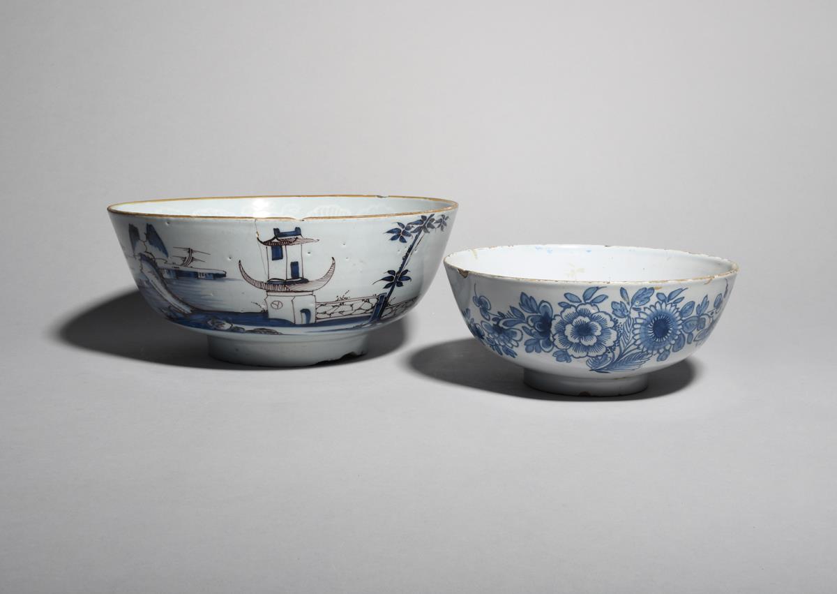 Two delftware bowls c.1750-80, the smaller probably Liverpool, inscribed in blue to the interior