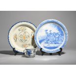 A Delft biblical charger 18th century, painted in blue with the Stoning of Stephen, within a