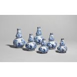 Three pairs of delftware miniature vases mid 18th century, in three sizes, the double gourd forms